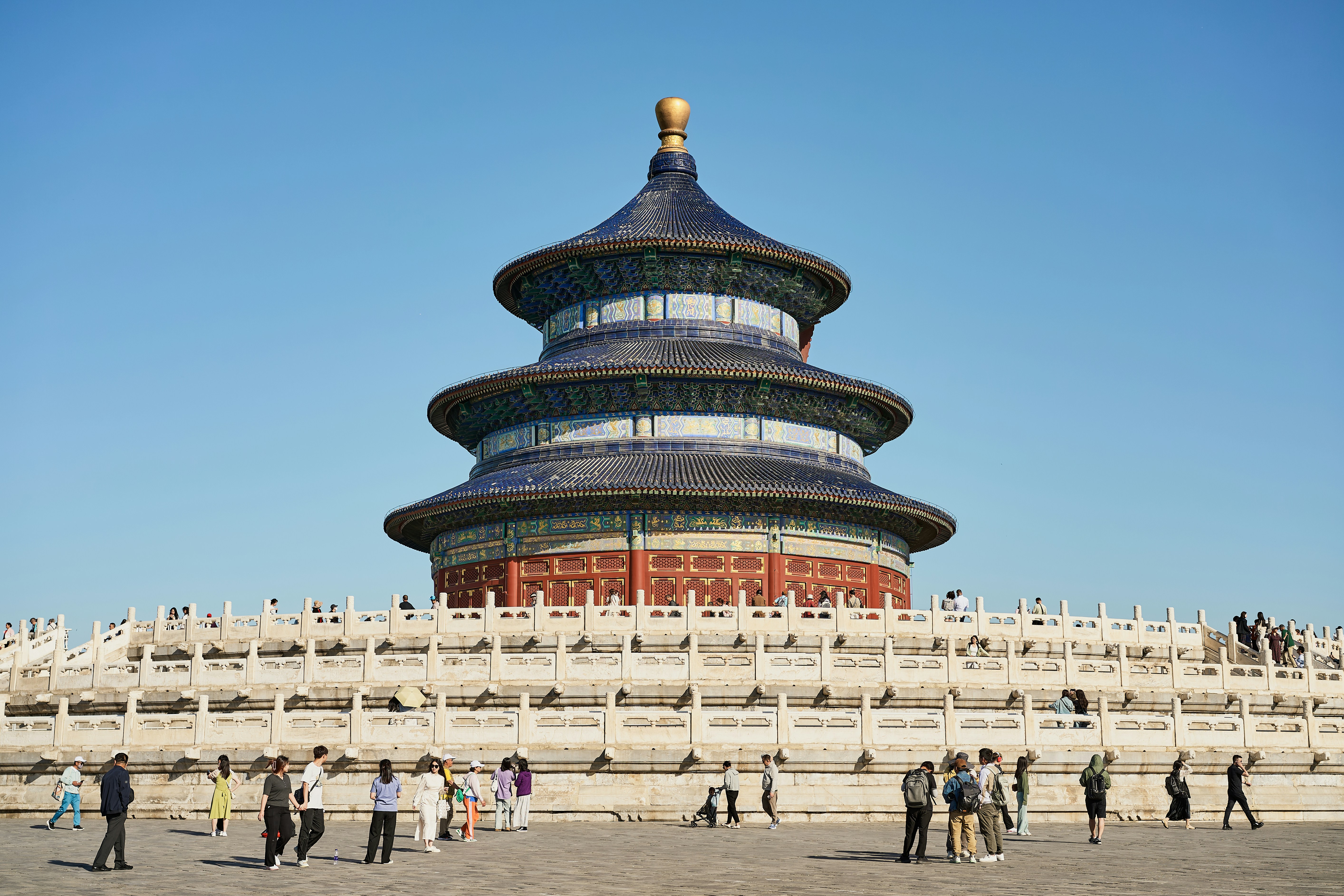 Beijing skyline — the Forbidden City anchors the imperial capital, the CCTV Tower represents the modern city.