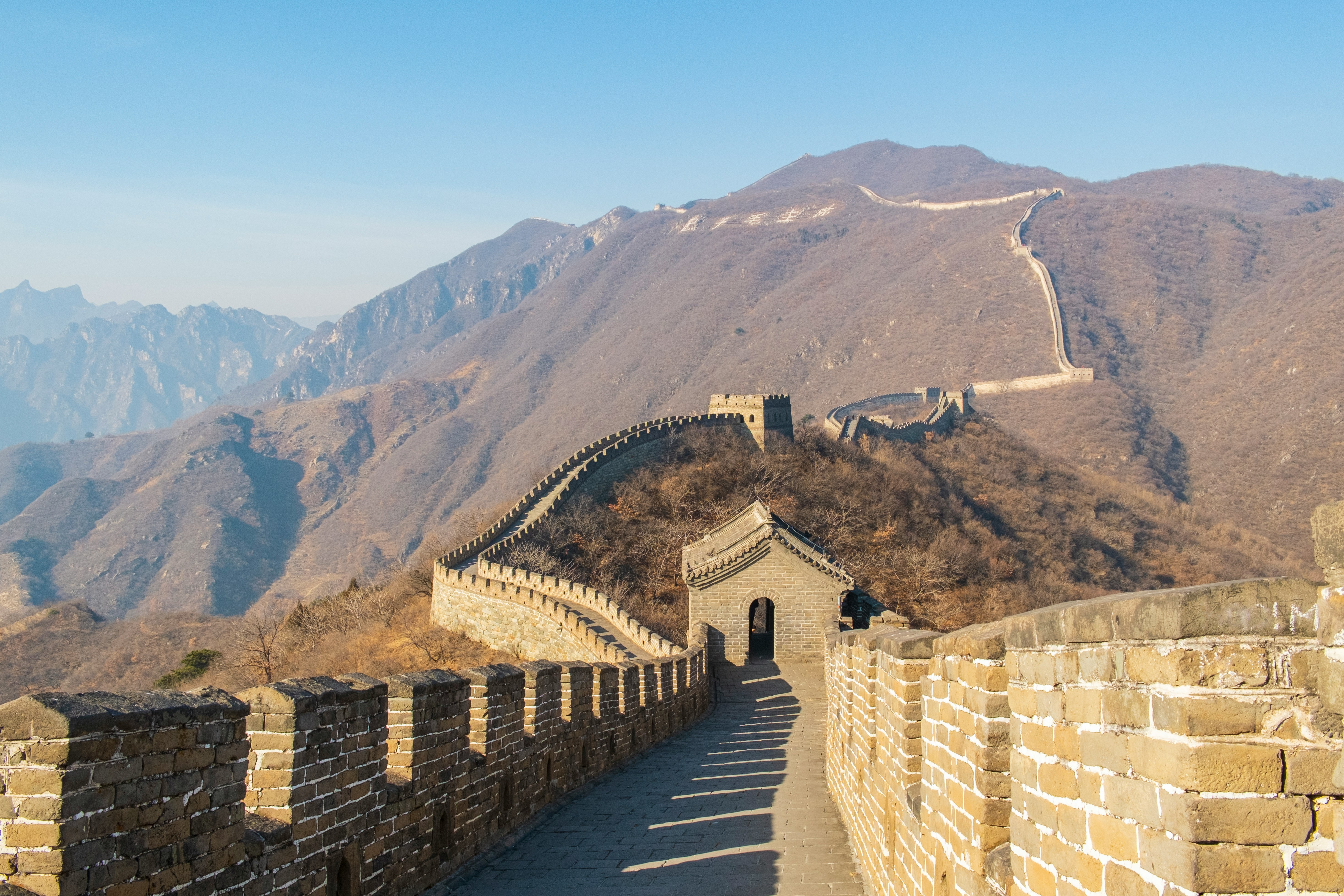 The Great Wall at Mutianyu in autumn foliage — the best day-trip section of the Wall for first-time visitors.