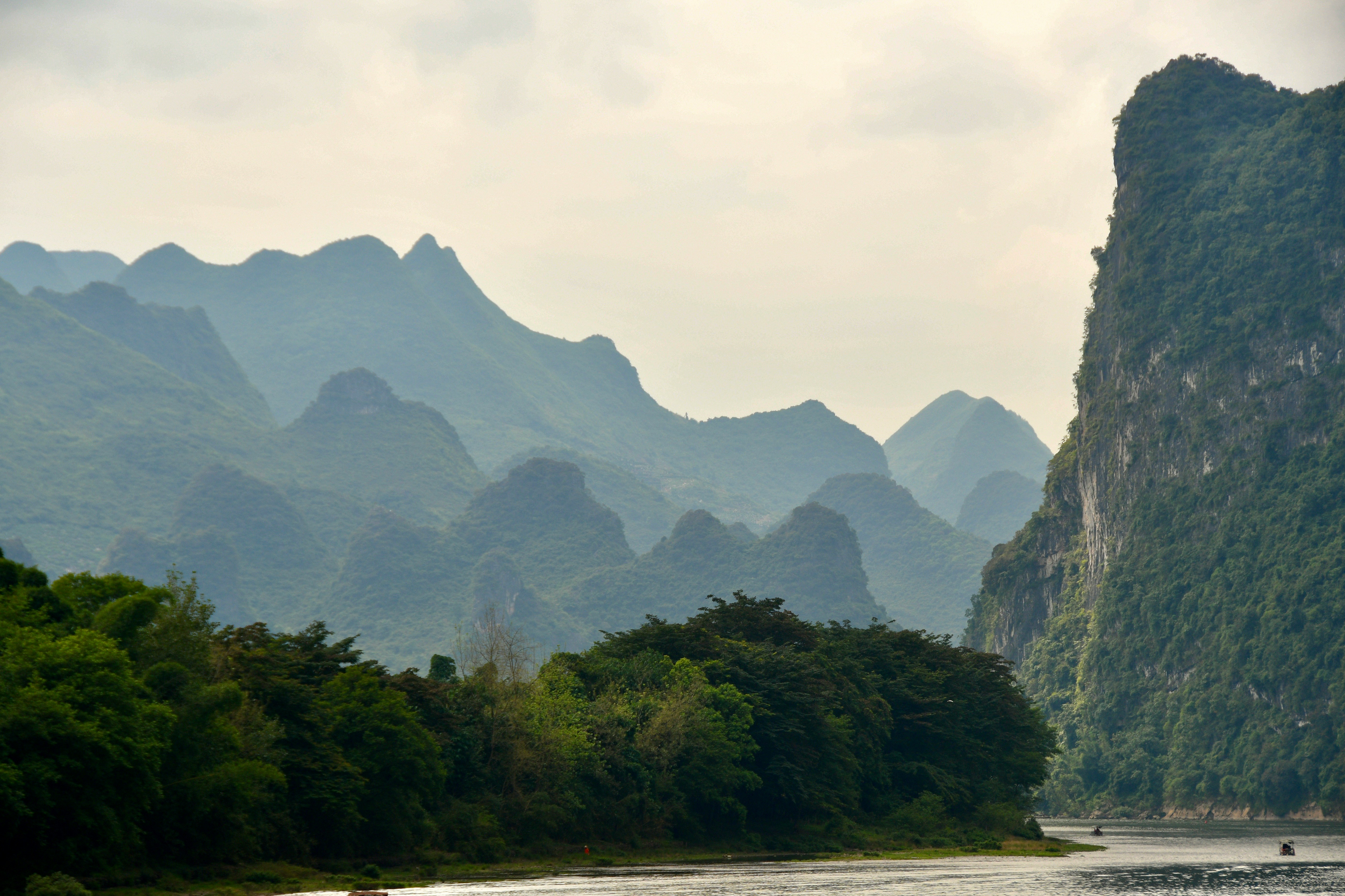 Karst mountains above the Li River near Yangshuo, Guilin — the most photogenic landscape in China and a 4-hour cruise from Guilin city.