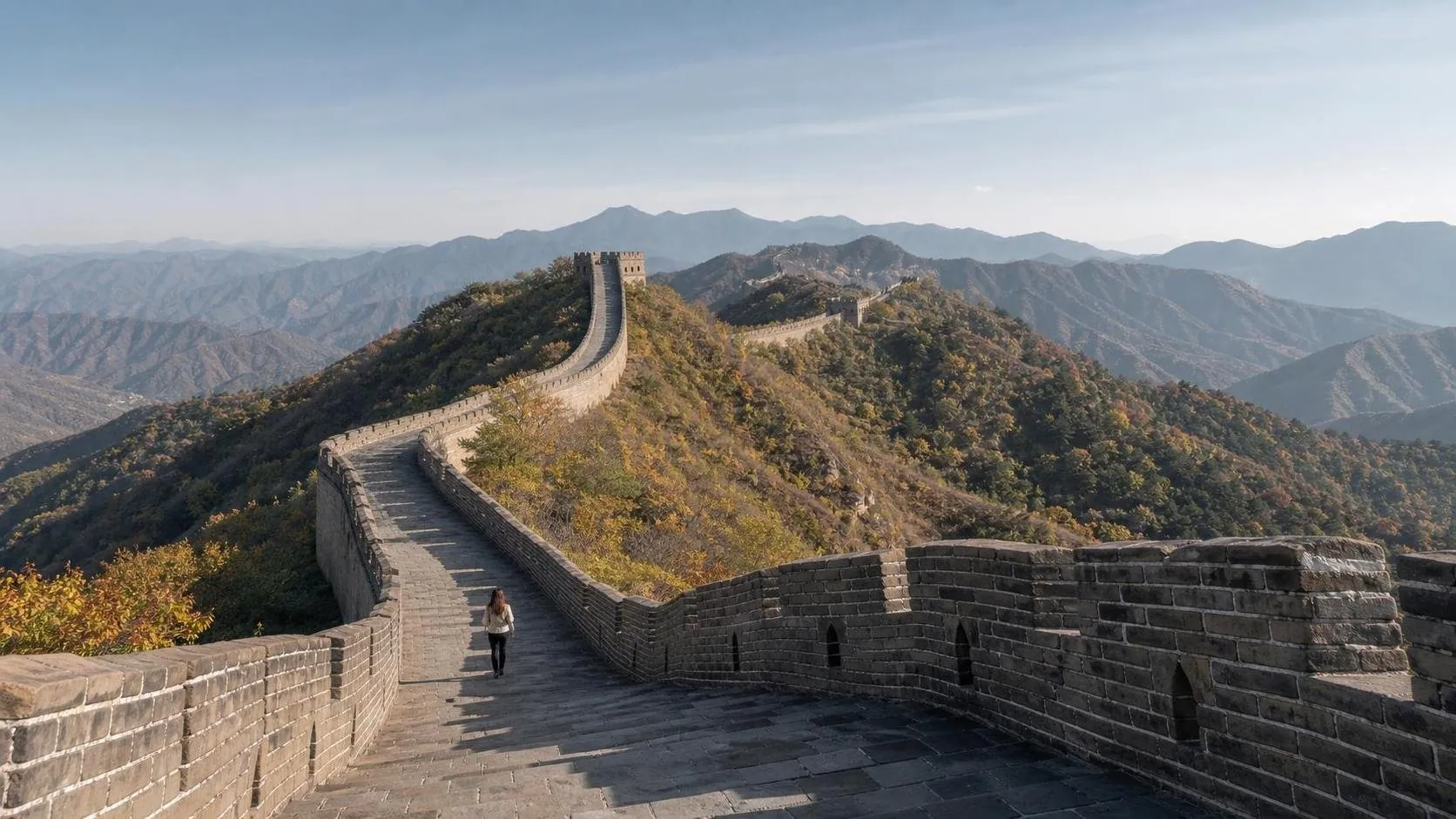 Traveler walking on the Great Wall during a classic first trip to China