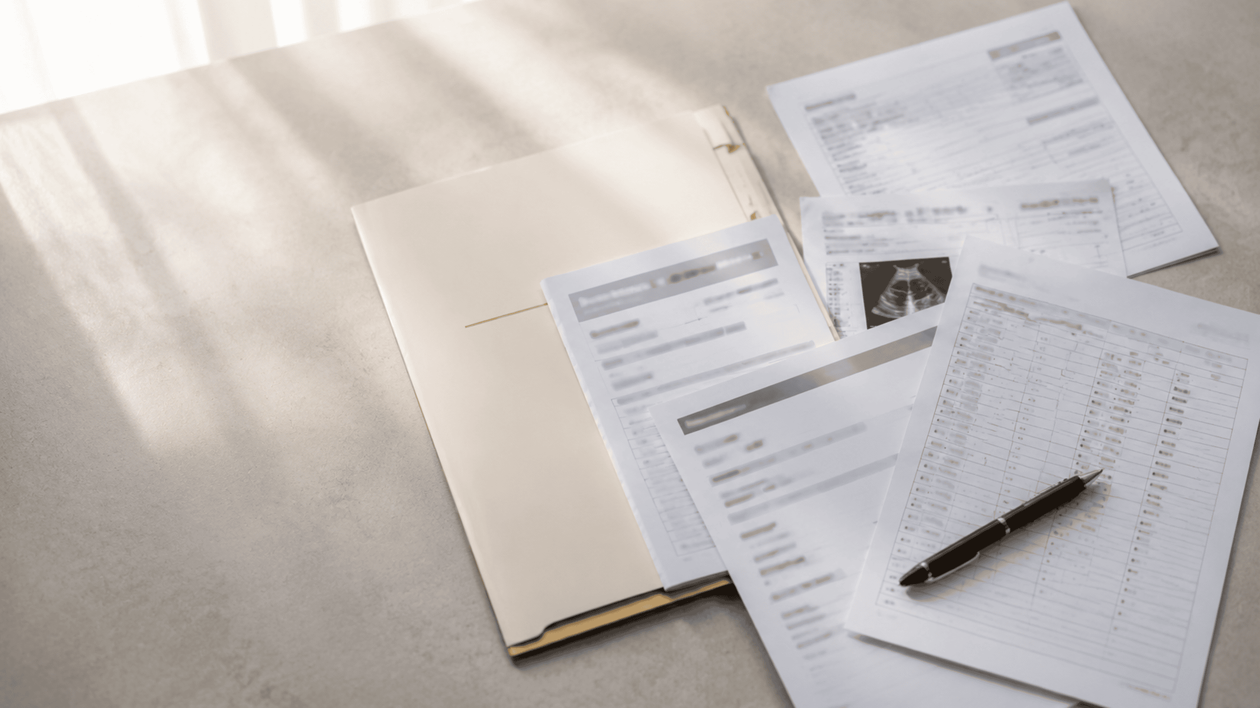 Travel medical records and receipts being organized for an insurance claim
